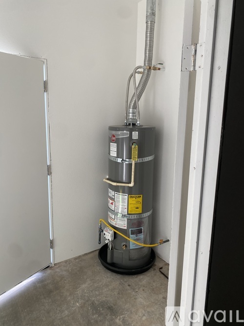 A water heater is installed in a room.