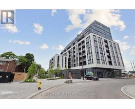 A modern building with the sign Kingsway Real Estate Brokerage on it.