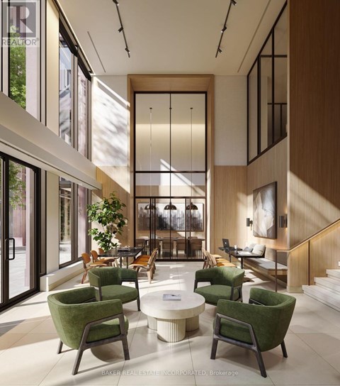 A modern living room with green chairs and a coffee table.