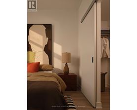 A spacious room with yoga mats and a pillar in the middle.