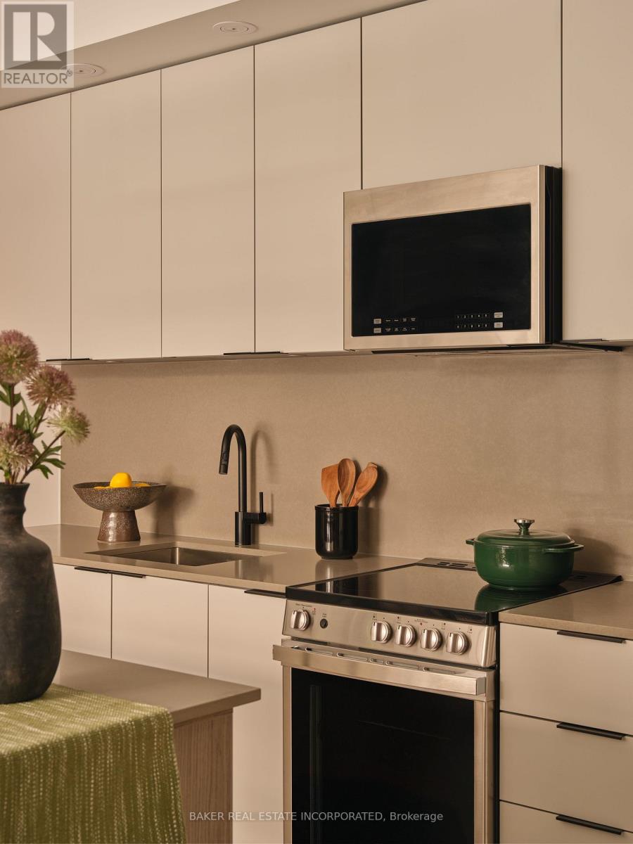 A floor plan of a home with a living room, two bedrooms, a kitchen, and a dining area.