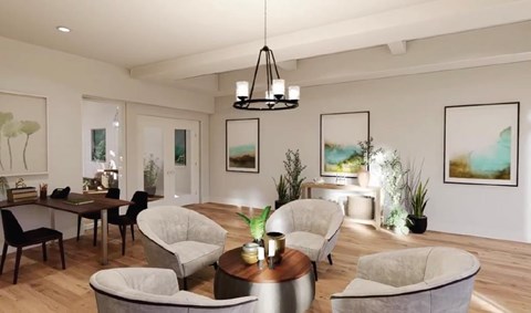 A modern living room with a dining table and grey armchairs.