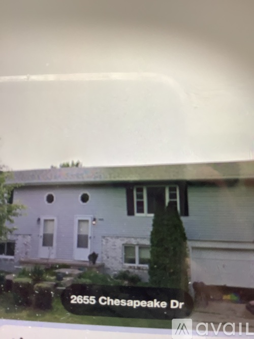 A house with the address 2655 Chesapeake Dr is for sale.