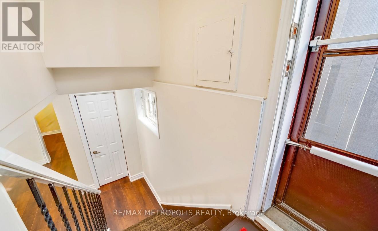 A view of a staircase leading to a second floor.
