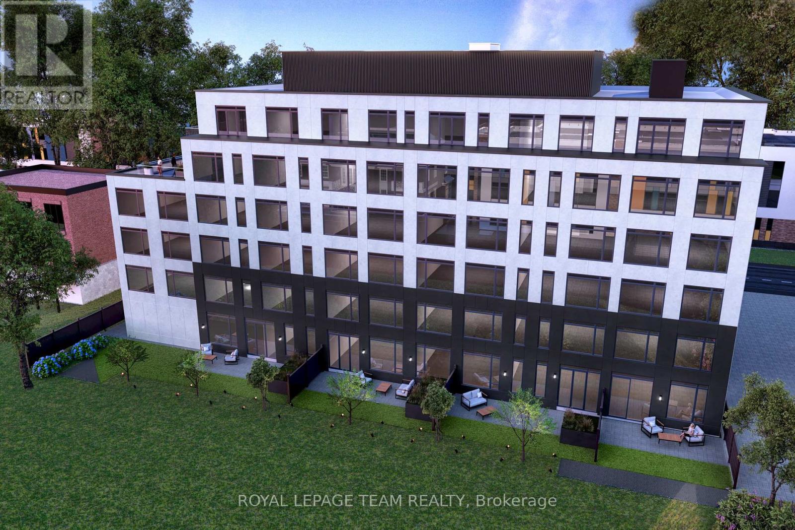 A rendering of a modern building with the text "ROYAL LEPAGE TEAM REALTY, Brokerage" on the side.