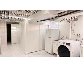 A laundry room with a washer and dryer.