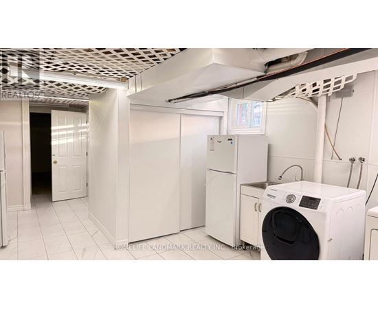 A laundry room with a washer and dryer.
