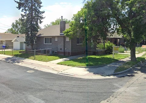 A residential area with houses and trees.