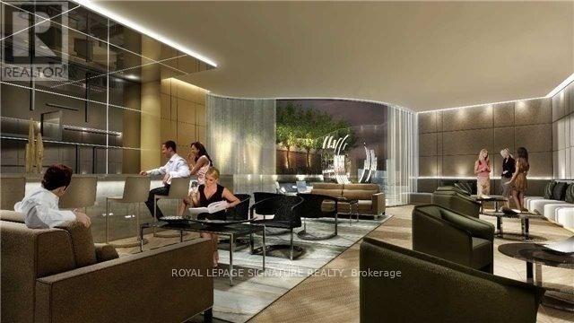 A modern living room with people sitting and chatting.