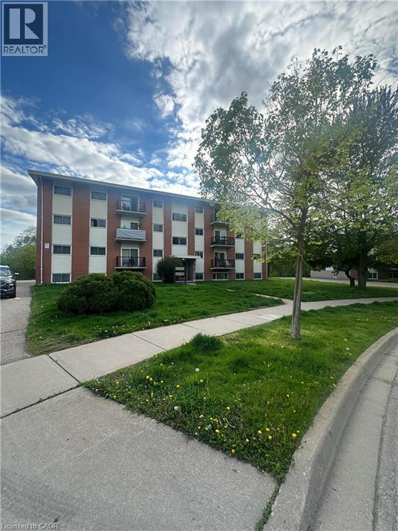 A building with a sign that says REALTOR in front of it.