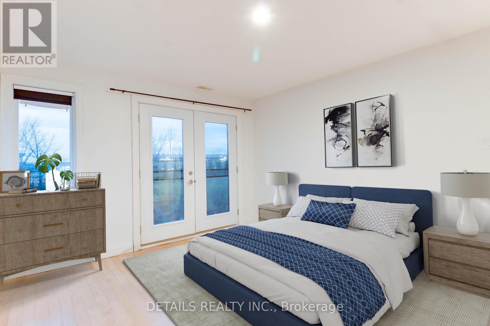 A bedroom with a bed, nightstands, and a dresser.