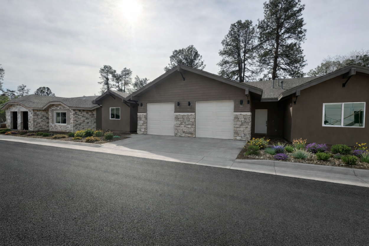 A house with a driveway in front of it.