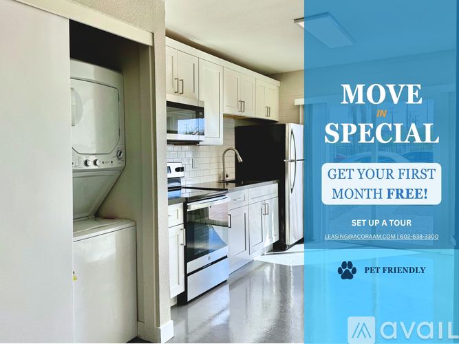 A kitchen with a sign offering a free first month for a move in special.