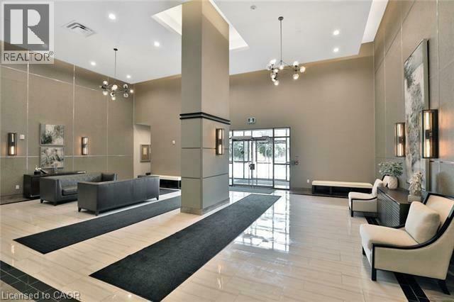 A spacious lobby with a black and white color scheme.