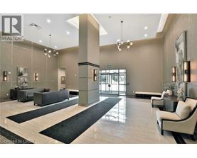 A spacious lobby with a black and white color scheme.