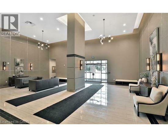 A spacious lobby with a black and white color scheme.
