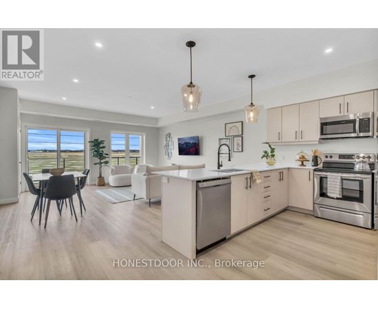 A modern kitchen with a dining table and chairs.