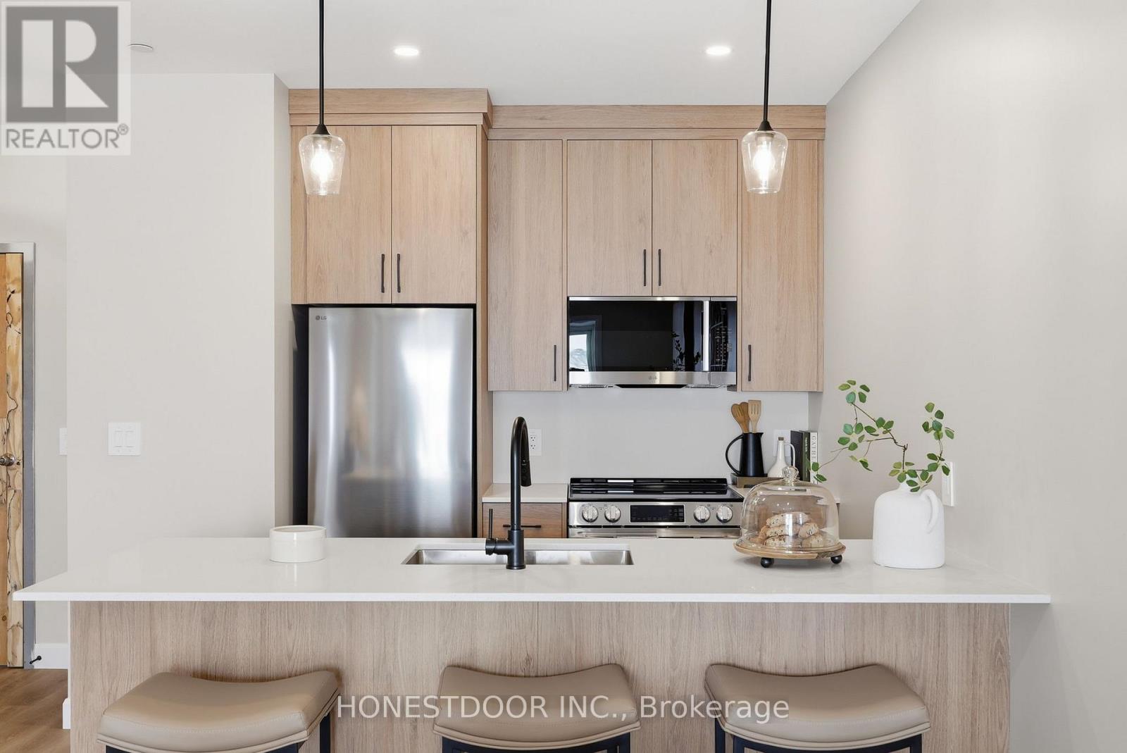 A floor plan of a home with a living room, dining room, kitchen, and two bedrooms.