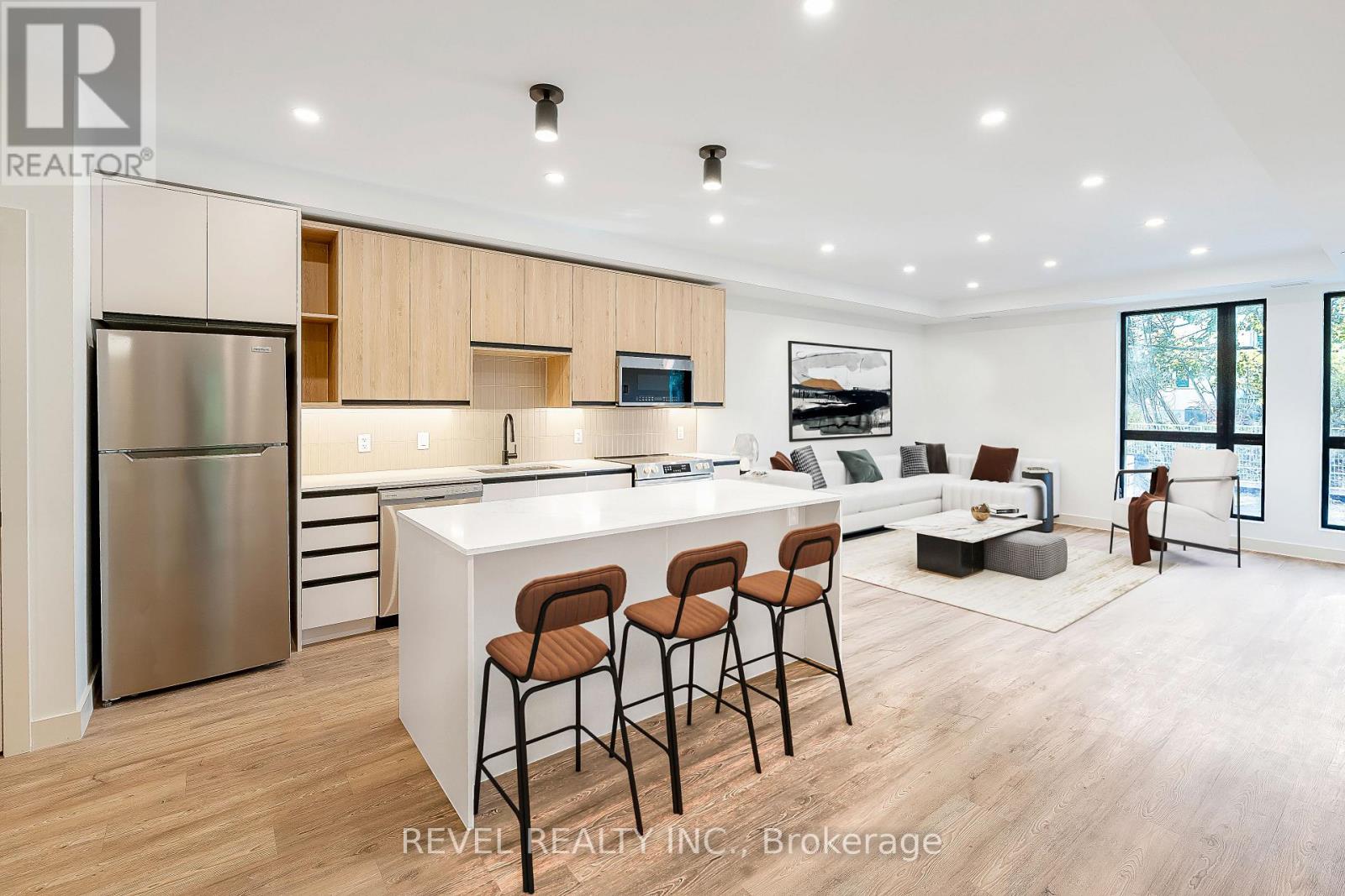 A modern kitchen with wooden cabinets and a white island.