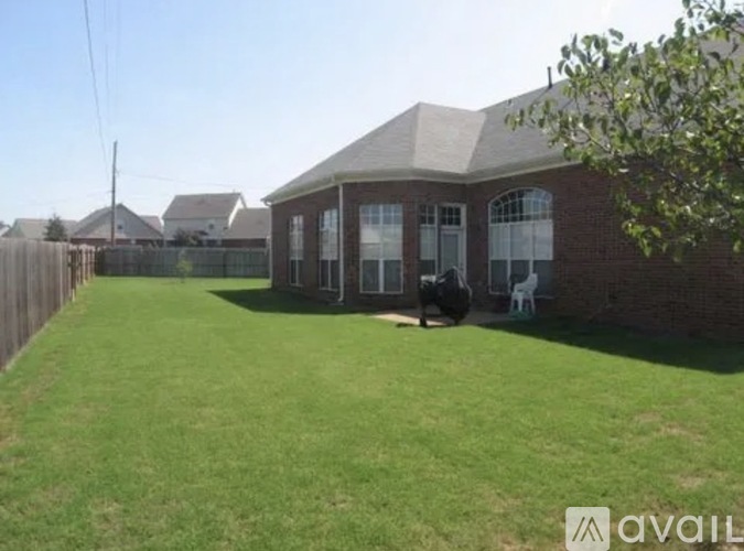 A house with a lawn in front of it is for sale.