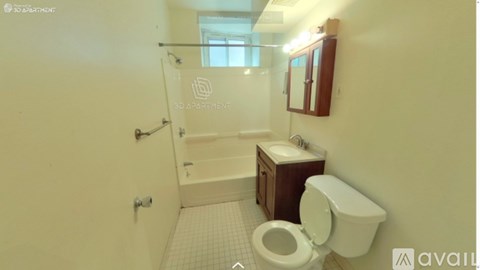 A small bathroom with a toilet, sink and shower.
