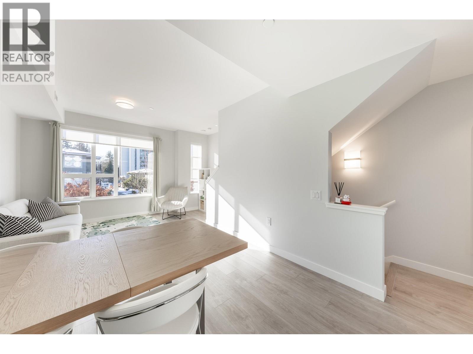 A realtor logo is on the top left corner of the image.