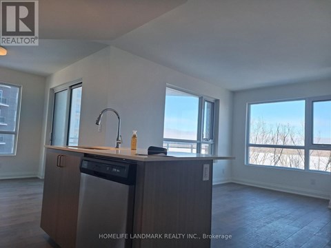 A kitchen with a dishwasher and a sink.