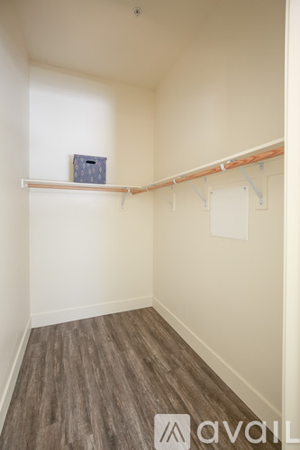 A room with a shelf and a box on it.