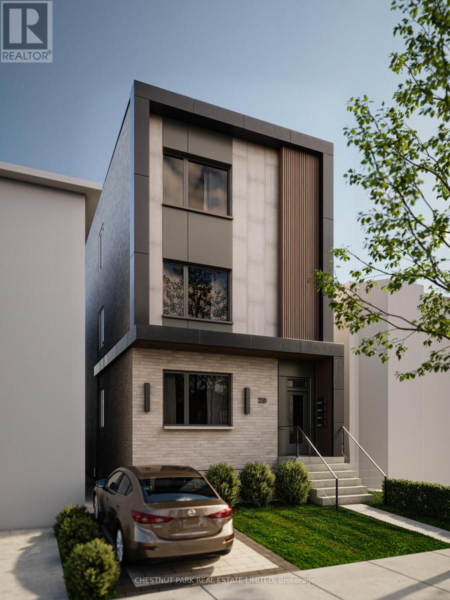A modern two-story house with a car parked in front.