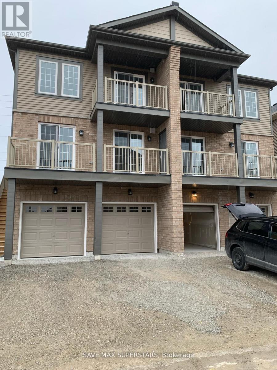A two-story residential building with a balcony on the upper floor.