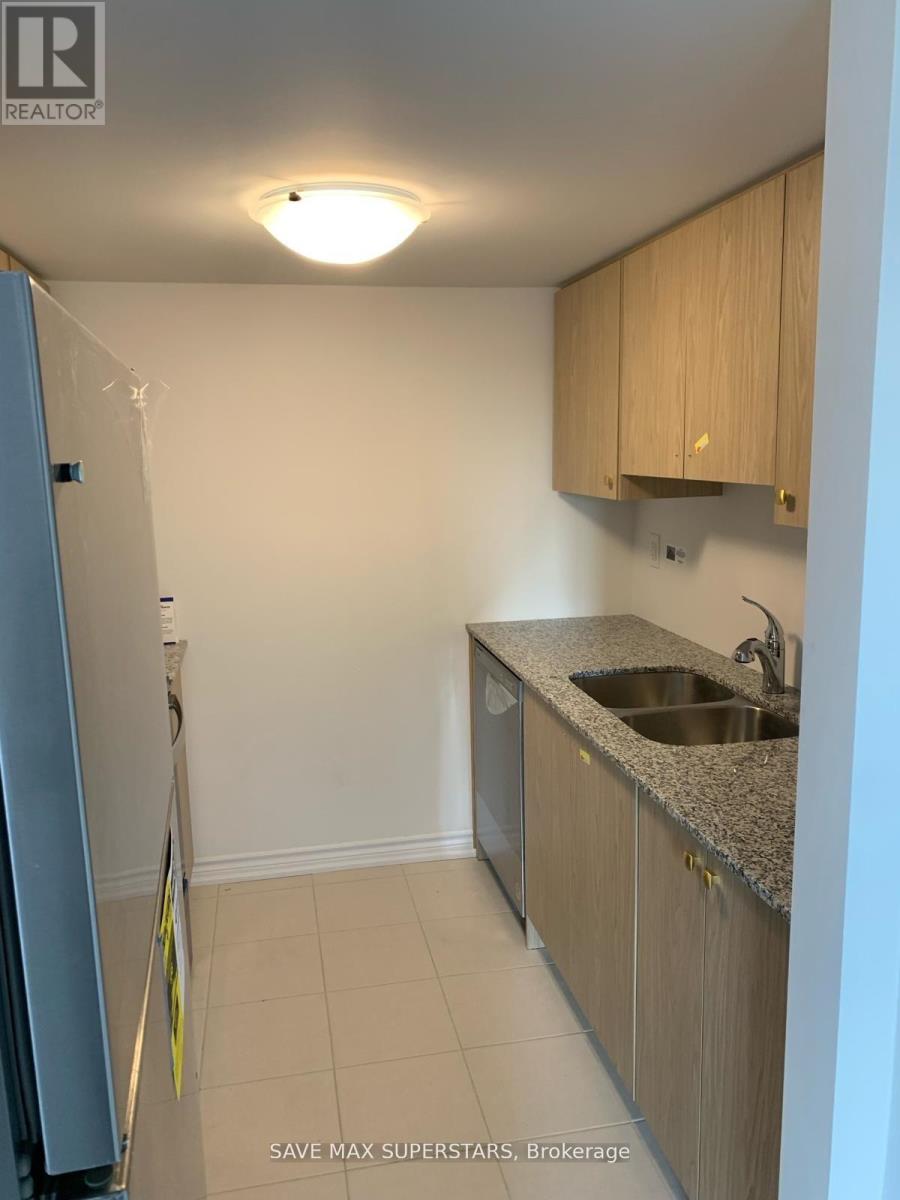 A kitchen with a sink and cabinets.
