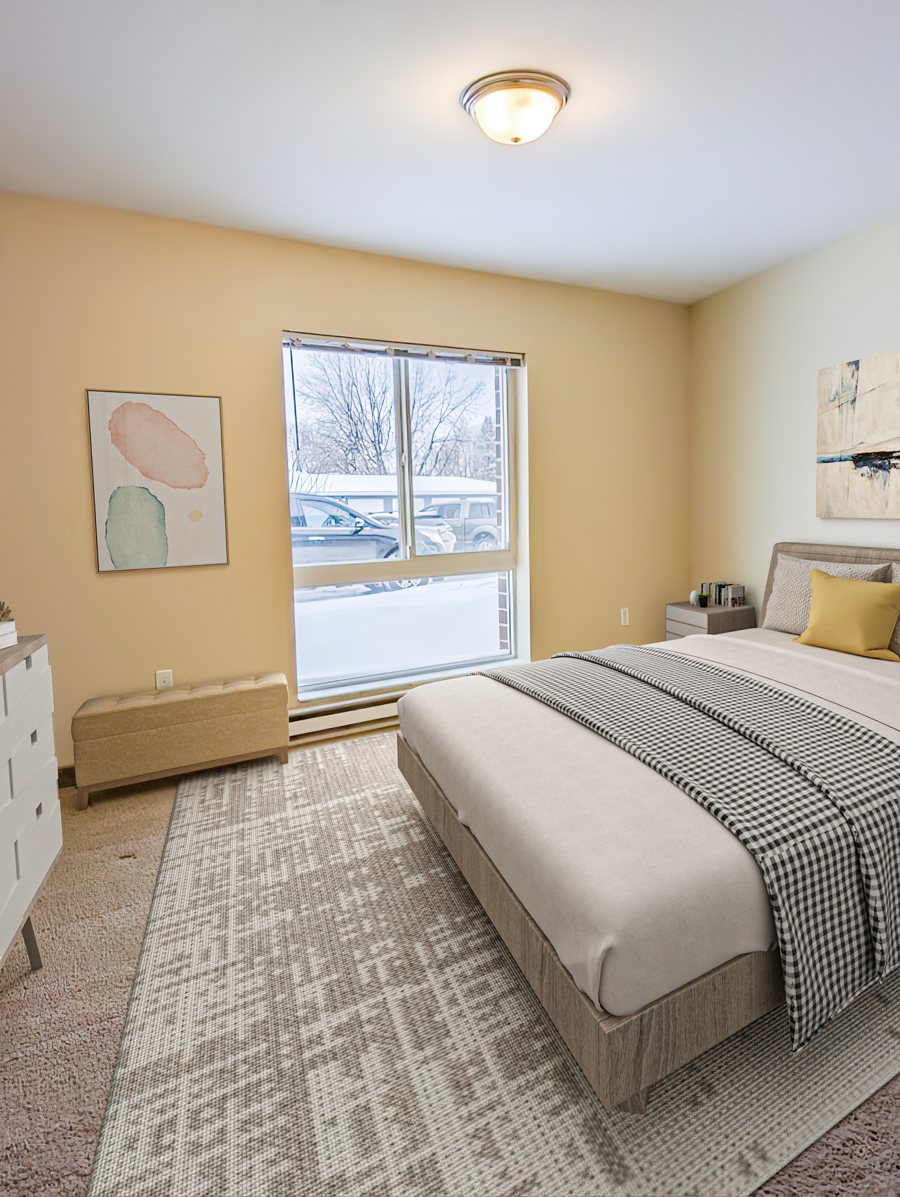a bedroom with a bed and a large window