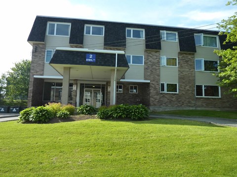 A building with a blue sign that says "2" on it.