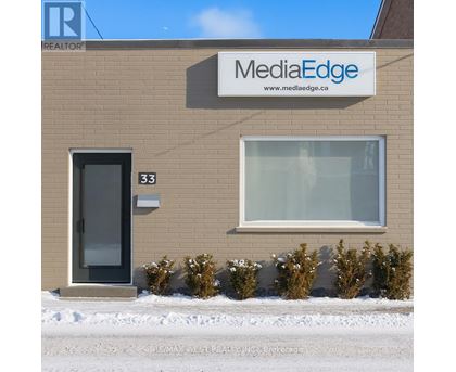 A building with a sign that says MediaEdge on it.