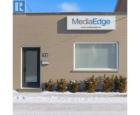 A building with a sign that says MediaEdge on it.