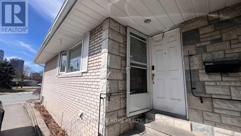 A house with a white door and a sign that says "For Sale" is shown.