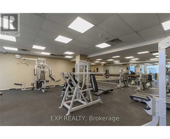 A gym with a variety of equipment including a leg press machine.
