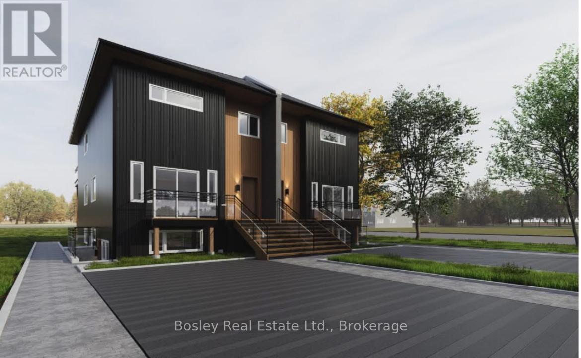 A modern two-story house with a black exterior and a large front porch.