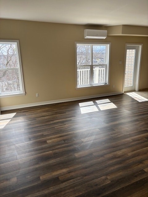 A room with wooden floors and a window.