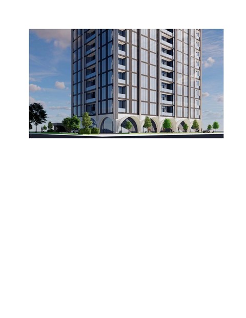 A tall building with many windows and balconies is surrounded by trees.