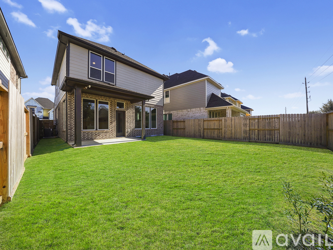A house with a large backyard is for sale.