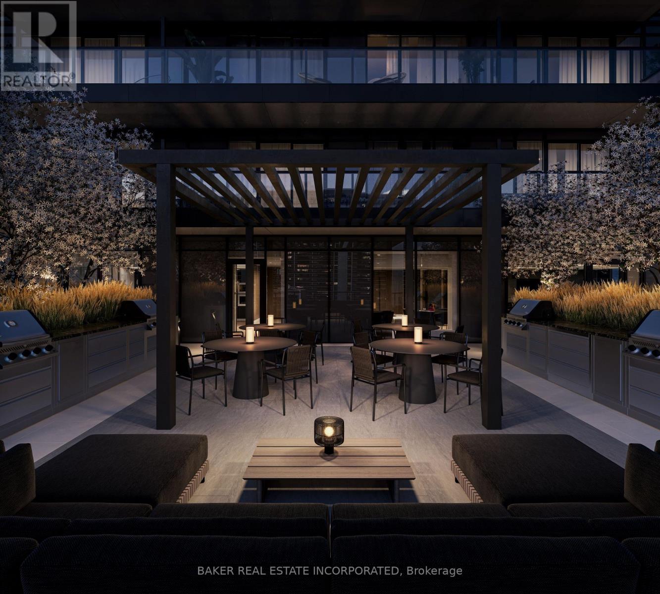 A modern outdoor dining area with a wooden pergola and black furniture.