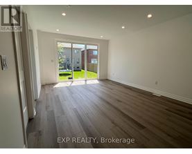 A room with EXP REALTY, Brokerage watermark on the floor.
