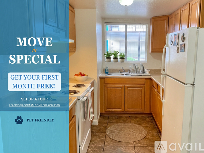 A kitchen with a sign offering a first month free for rent.