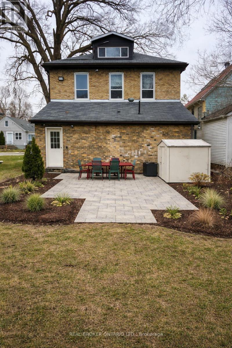 A house with a brick exterior and a white door.