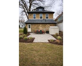A house with a brick exterior and a white door.