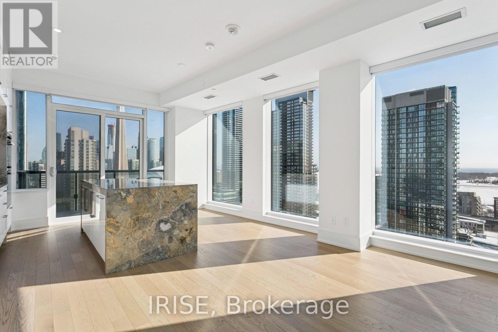 A real estate office with a view of the city.
