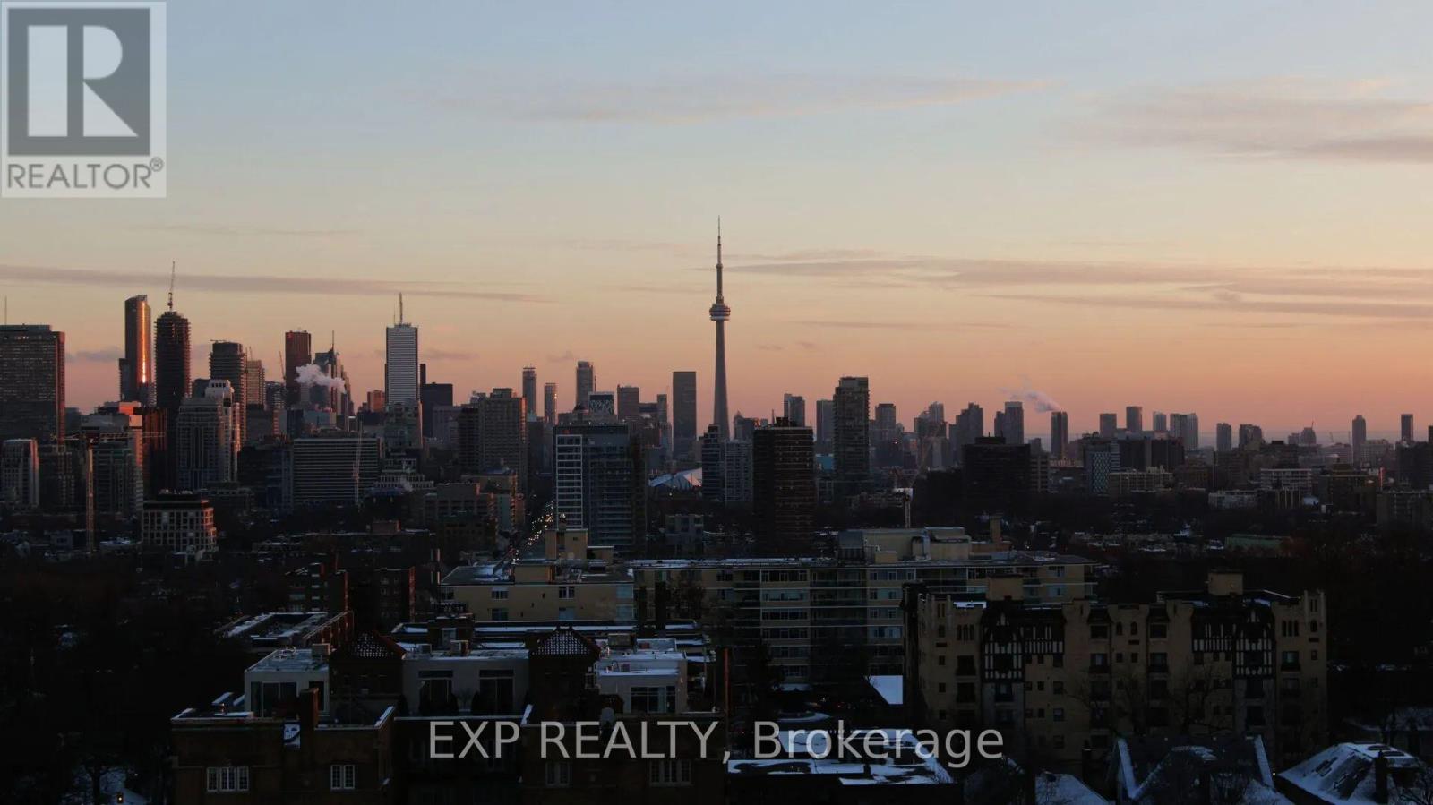 A cityscape with buildings and a tower in the background with EXP REALTY Brokerage written on the bottom.