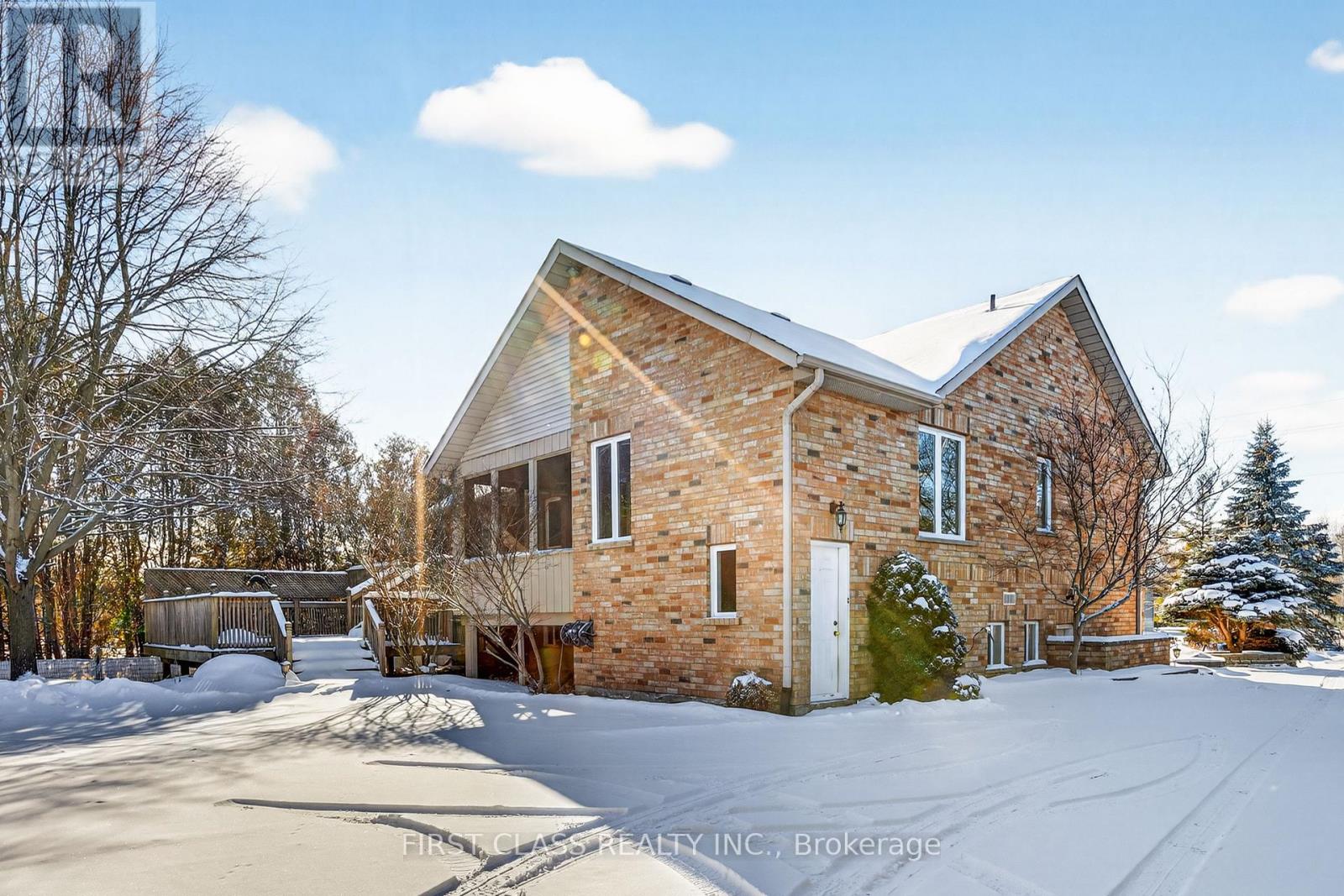 A house with a snowy front yard.