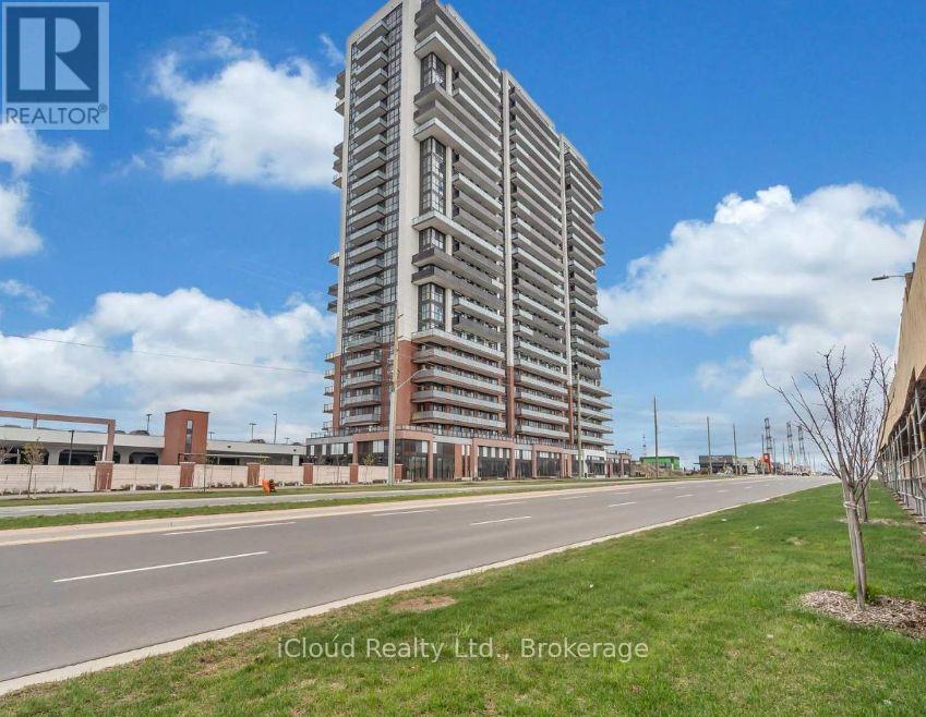 A tall building with a lot of windows is in the background.